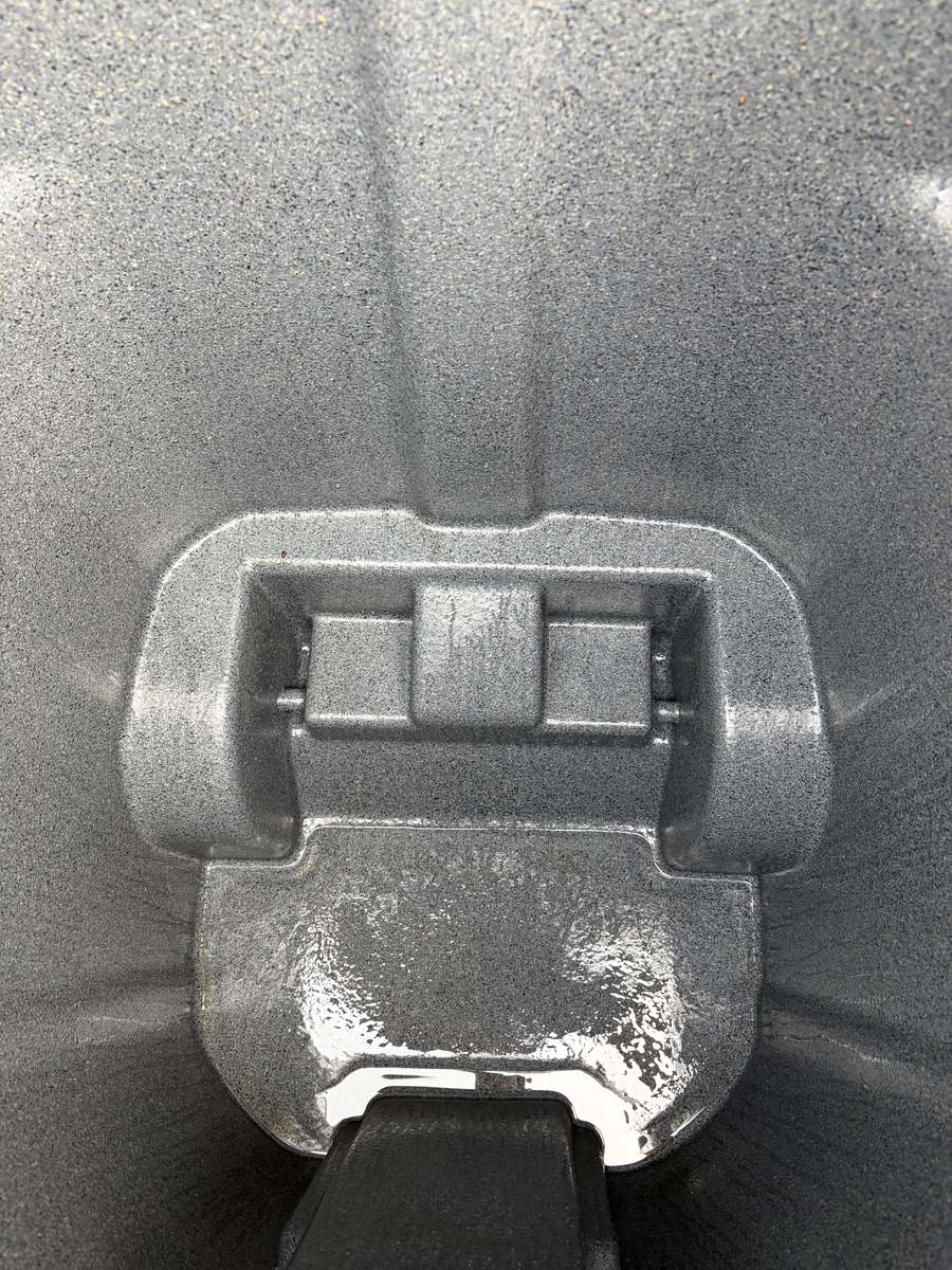 Clean, sanitized garbage bin lid after Eco Pro Wash cleaning